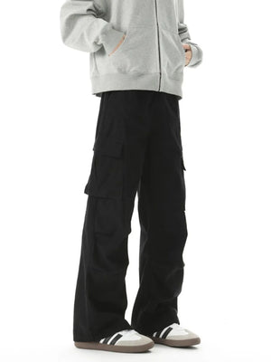 Relaxed fit black cargo pants with multiple utility pockets and a wide leg.