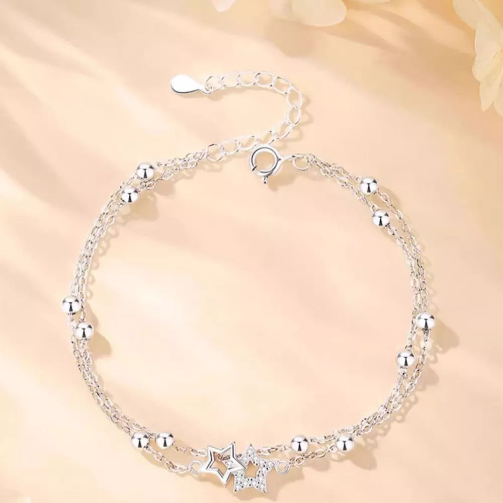 clear bracelet featuring zircon embellishment and geometric