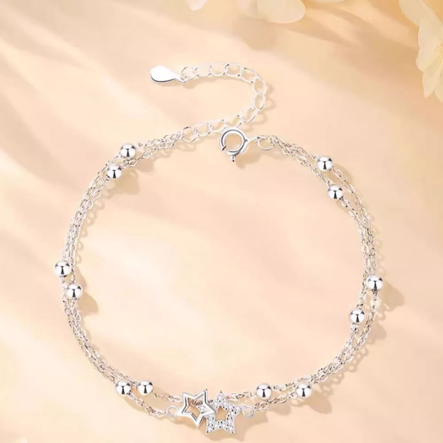 clear bracelet featuring zircon embellishment and geometric