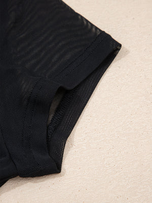 Black sheer mesh cap sleeve t-shirt with visible stitching detail.