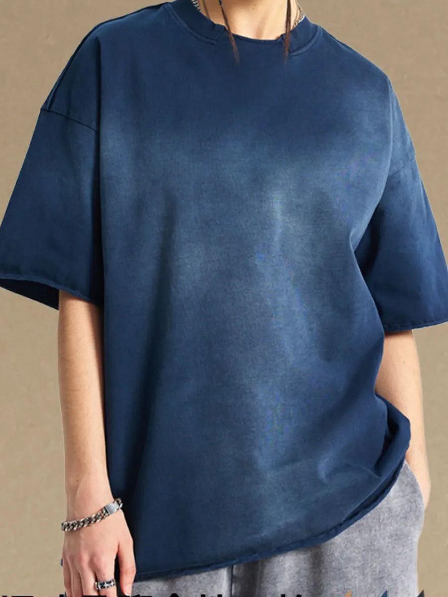 Navy acid wash boxy tee with raw hem and crew neck.