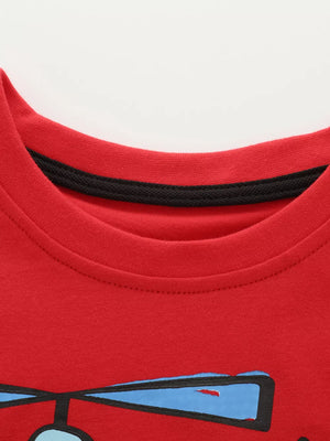 Red cotton toddler t-shirt with helicopter graphic and black neck trim.