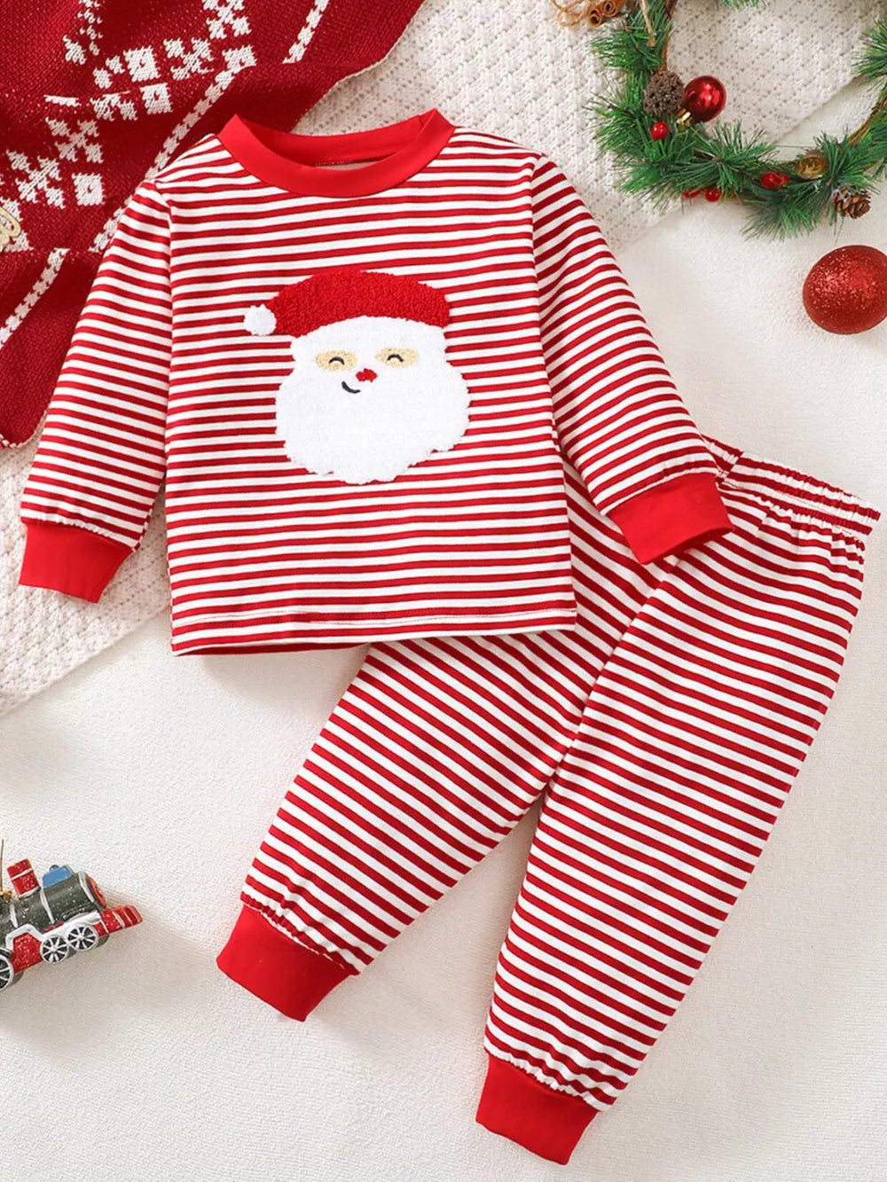 Baby red and white striped Santa pajama set with applique detail