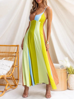 Vibrant color block maxi dress with spaghetti straps and side slits.