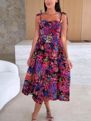 Floral tie-strap midi dress with a sweetheart neckline and A-line skirt.