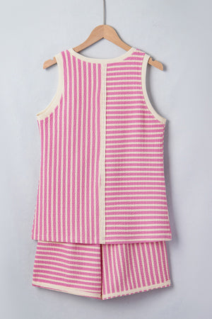 Textured stripe two-piece set with pink and cream vertical and horizontal stripes.
