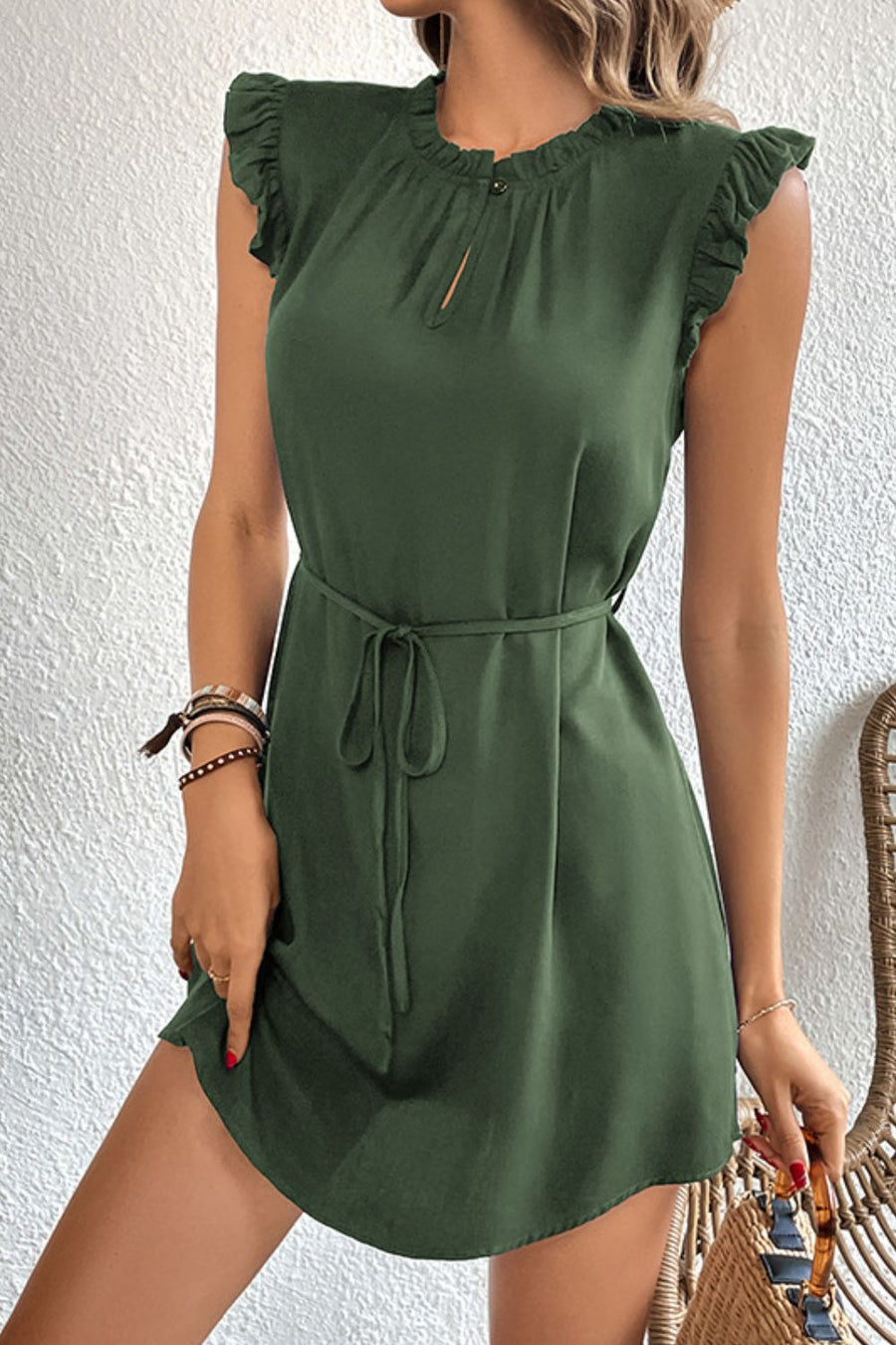Army green mini dress with ruffled yoke, keyhole neckline, short sleeves, and tie waist.