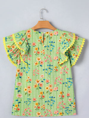 Floral printed cotton blouse with ruffle short sleeves and yellow trim.