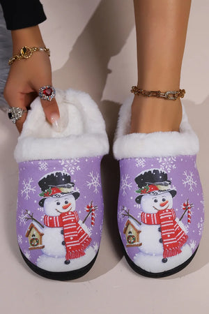 Purple faux fur lined slippers with snowman print and snowflakes.