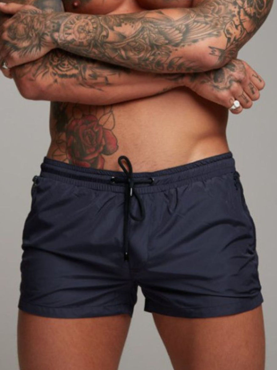 Navy swim shorts with drawstring waist