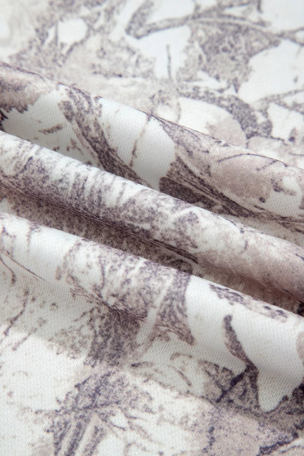 pullover hoodie featuring abstract in taupe with 100% polyester Care instructions: Machine wash cold texture