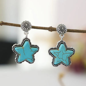Southwestern starburst drop earrings in sky blue with distressed detail and silver-tone metal.