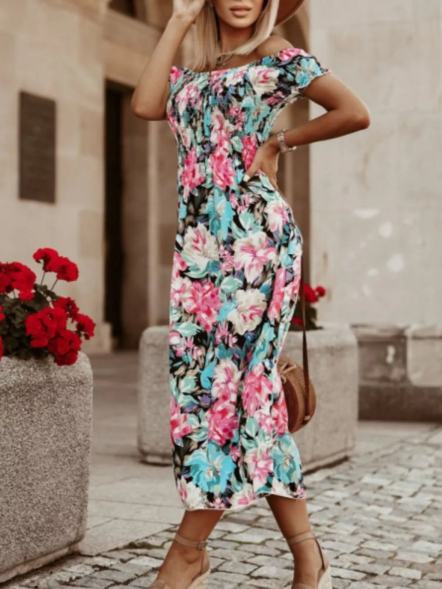Floral off-shoulder midi dress with smocked bodice and short sleeves.