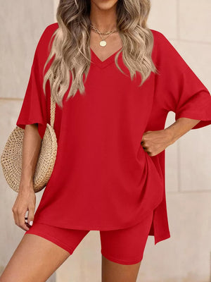 Red V-neck two-piece set with loose tee and bike shorts, casual comfortable women's outfit