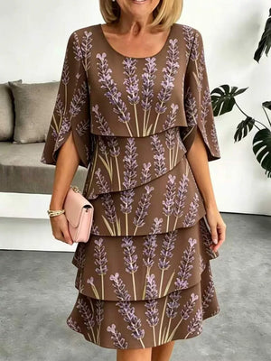 Brown floral tiered ruffle hem dress with split sleeves and scoop neck.