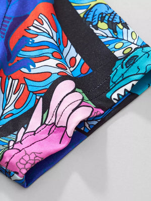 T-shirt with a vibrant abstract floral and dragon print, featuring black trim.