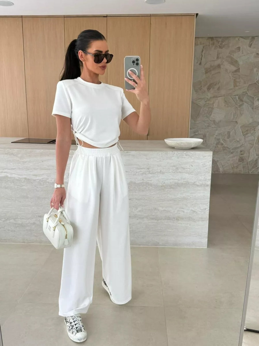 White crop top and wide-leg pants set with adjustable drawstring details