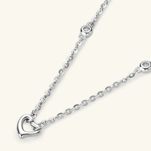 Silver linked heart pendant necklace with accent stones