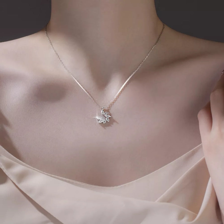 necklace featuring leaf in silver with 925 sterling silver,Zircon Care instructions: Avoid wearing during exercise, as