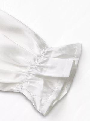 White ruffled cold shoulder maternity blouse sleeve detail