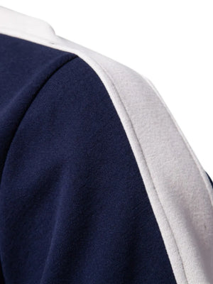 Navy quarter-zip sweatshirt with white and gray paneling detail on the shoulder.
