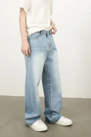 Baggy palazzo jeans in medium washed denim with a relaxed fit and wide leg.