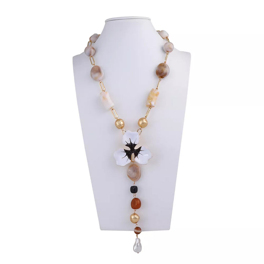 white necklace with flower pendant and N/A