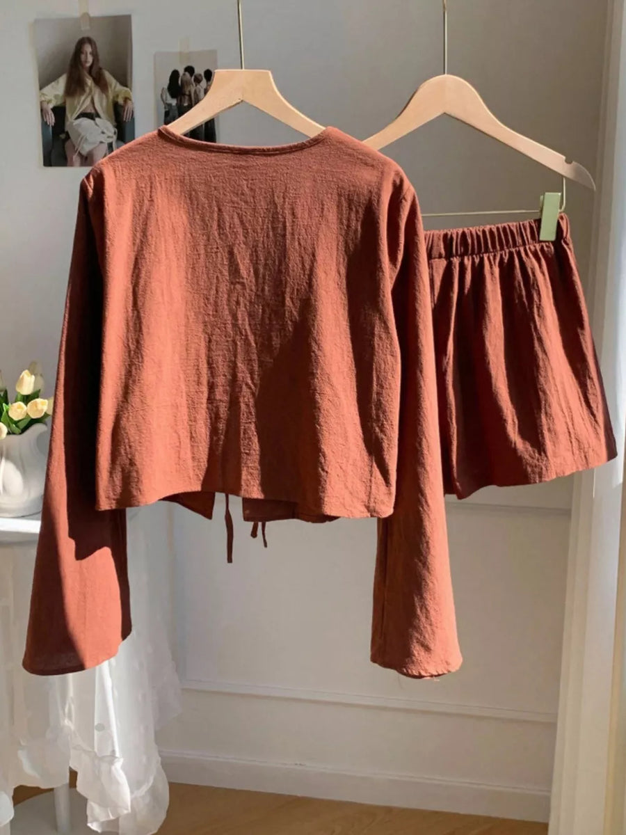 Brown tie-front cotton top and shorts set with wide sleeves.