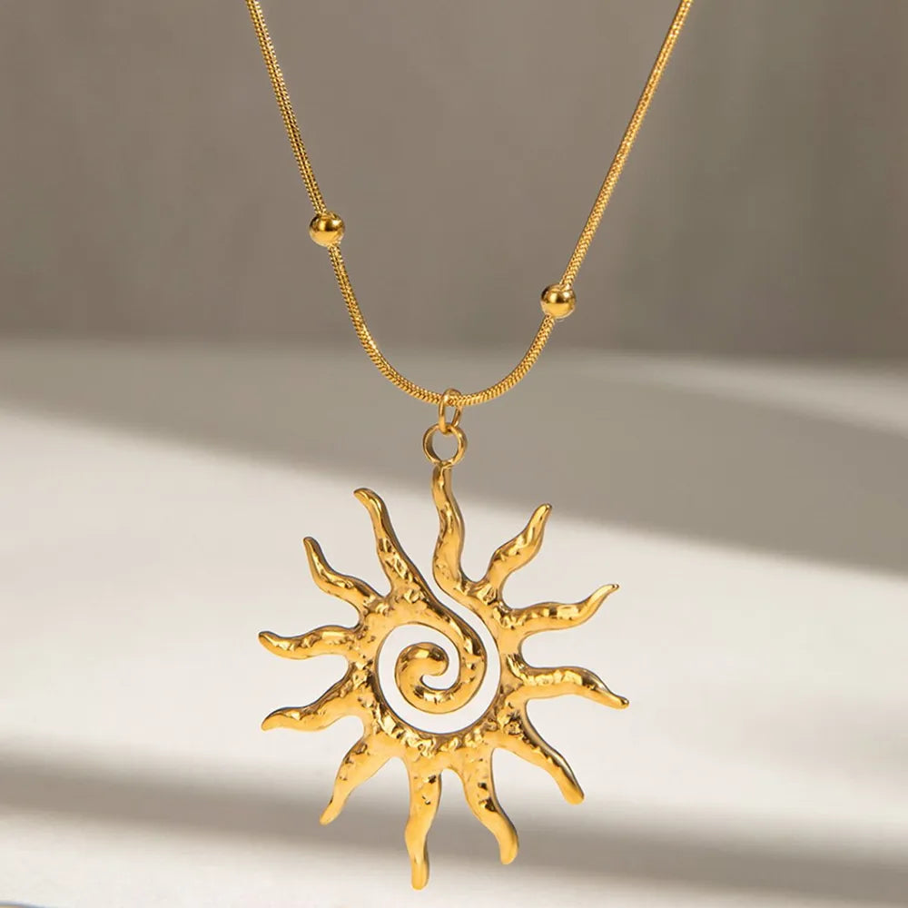 Gold necklace featuring 18K gold-plated and sun motif