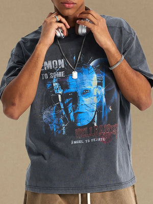 Dark gray relaxed fit tee with a graphic print of Pinhead from Hellraiser.