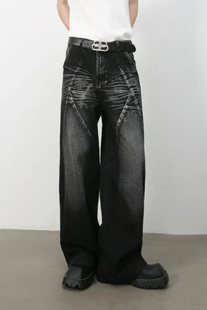 Dark wash wide leg jeans with sculpted detailing and a faded effect.