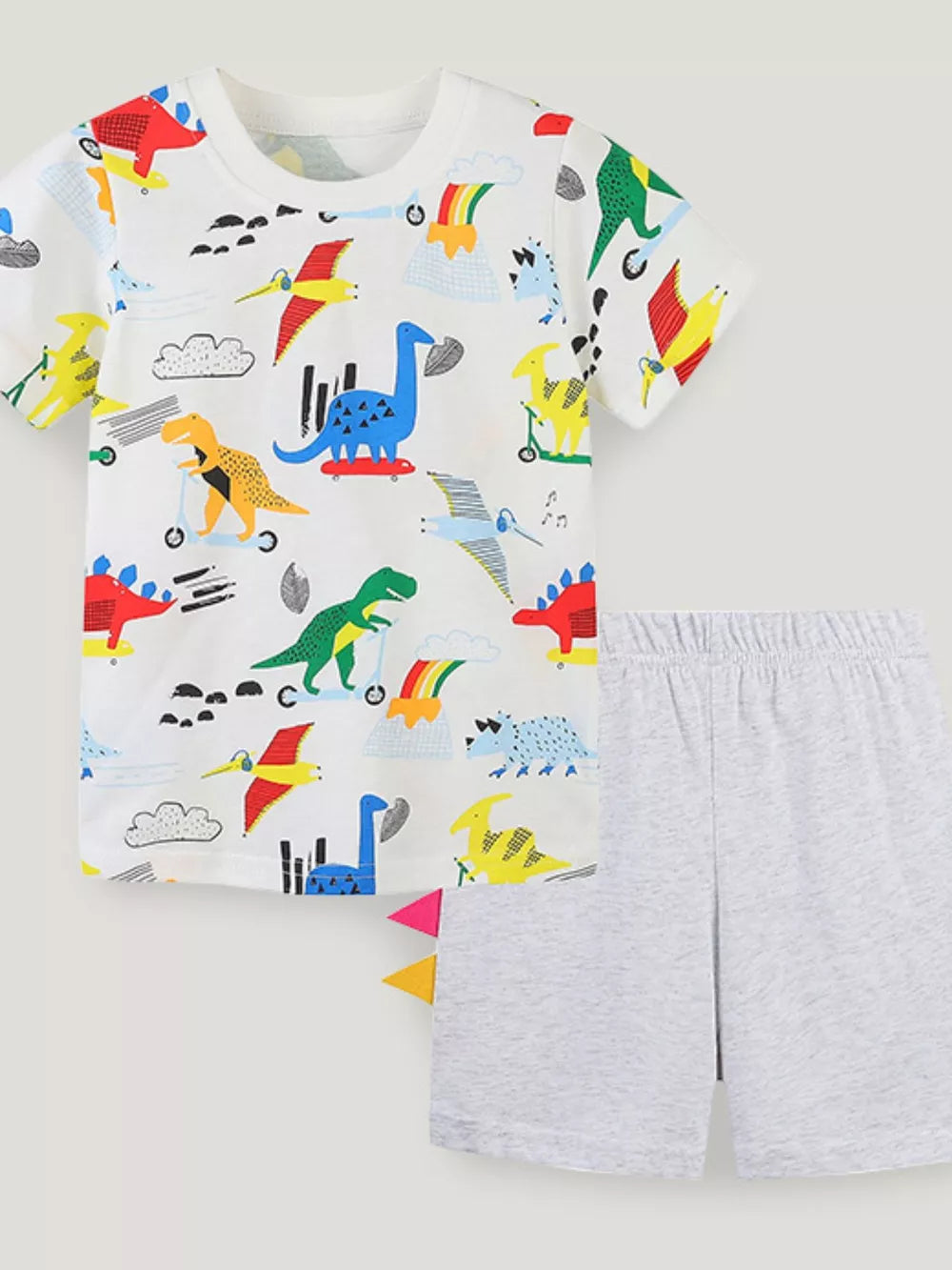 Toddler dinosaur graphic tee and grey shorts set with rainbow and volcano print.