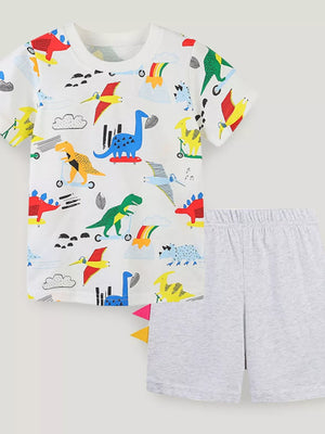 Toddler dinosaur graphic tee and grey shorts set with rainbow and volcano print.
