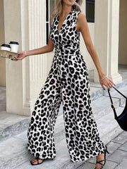 Sleeveless leopard print romper with V-neck and wide legs.