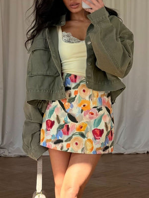 light blue denim jacket with flap pockets and long sleeve