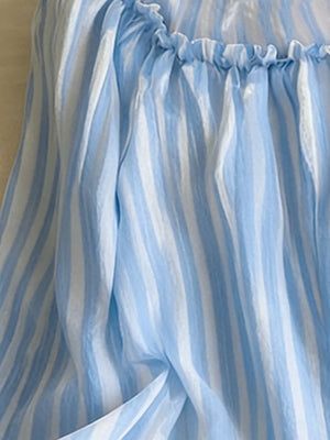 white blouse featuring frill and striped