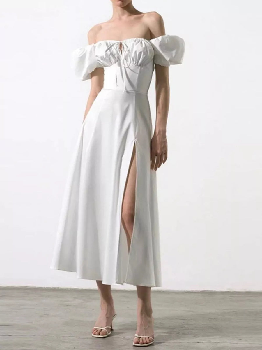 White puff sleeve tie front midi dress with off-shoulder neckline and thigh-high slit.