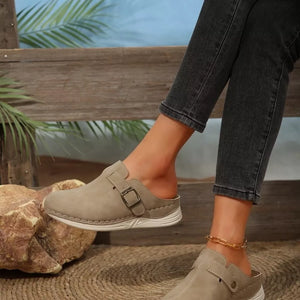 Buckle accent round-toe slip-on flats in khaki with contrast stitching and a casual design.