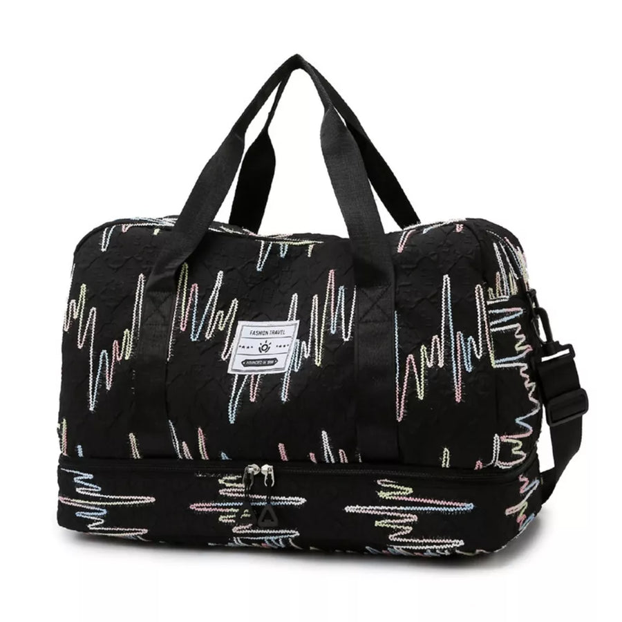 Textured black Oxford duffel bag with colorful wave pattern and dual zip bottom compartment.