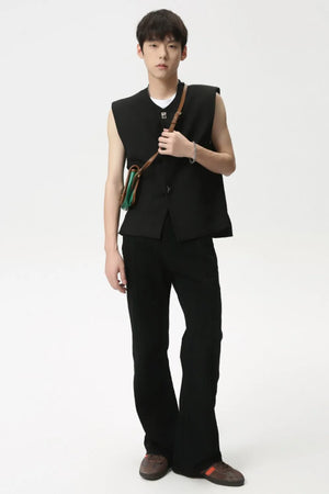 Black flare denim pants with panel seams and a subtle flare at the hem.