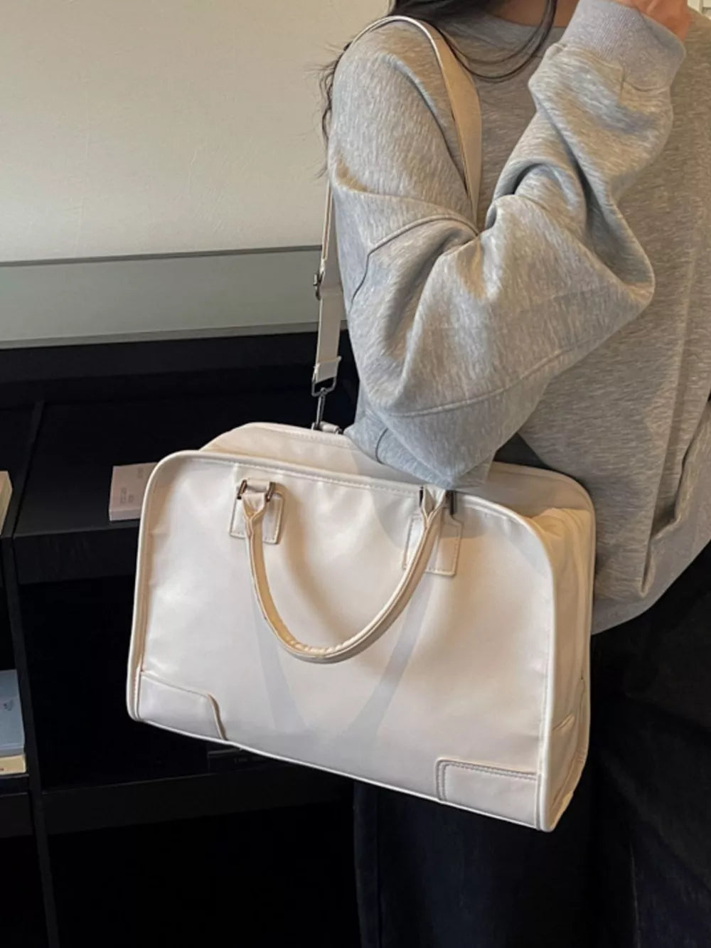 Cream pu leather travel bag with top handles and adjustable strap