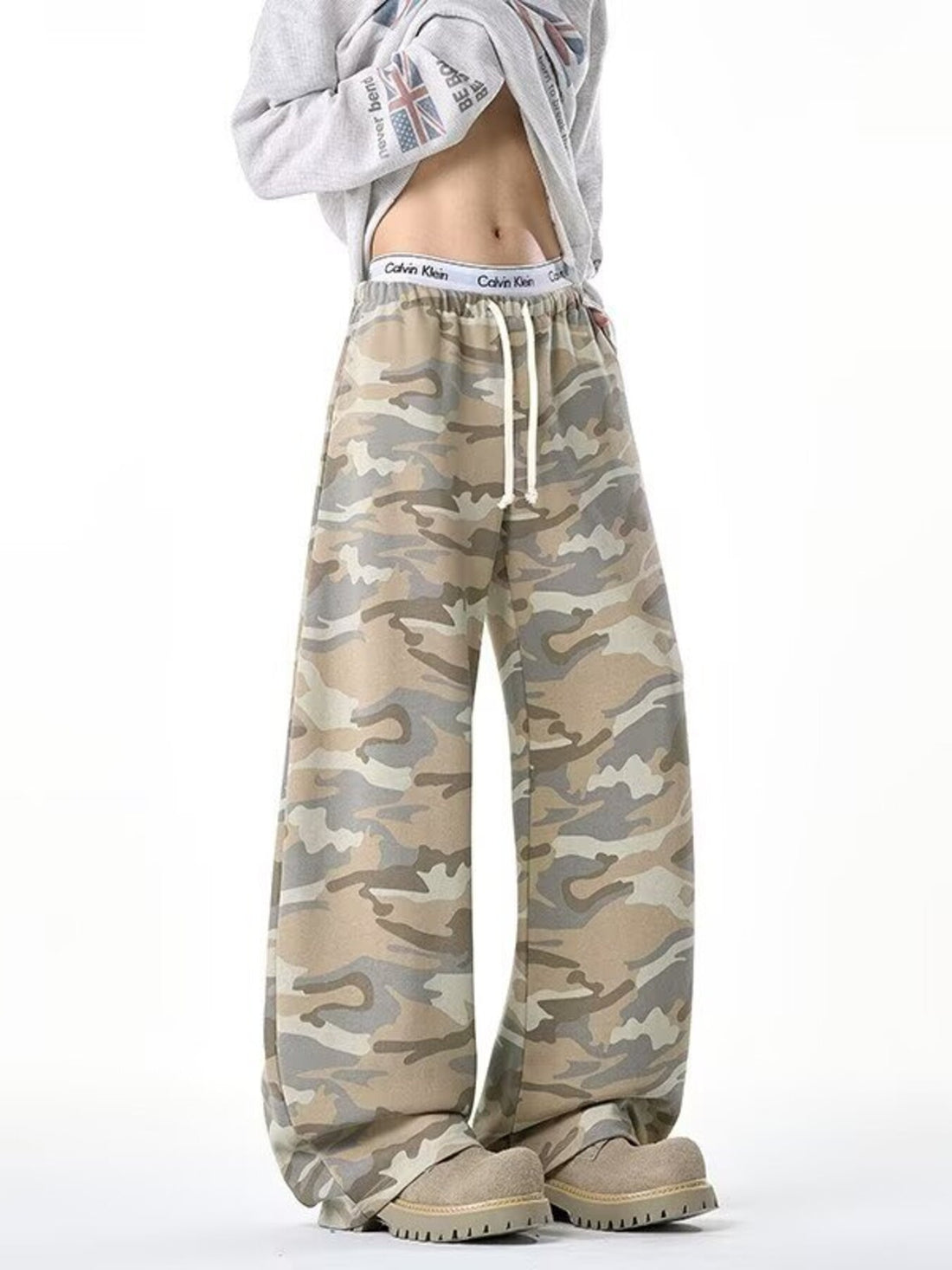 wide-leg pants in tan featuring drawstring waist and loose fit