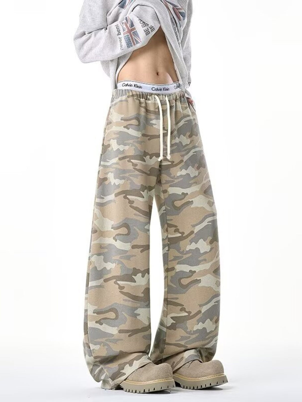 wide-leg pants in tan featuring drawstring waist and loose fit