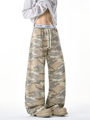 wide-leg pants in tan featuring drawstring waist and loose fit