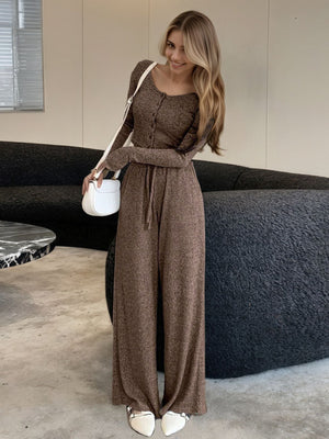 Brown ribbed knit button-down loungewear set with wide-leg pants and a drawstring waist.