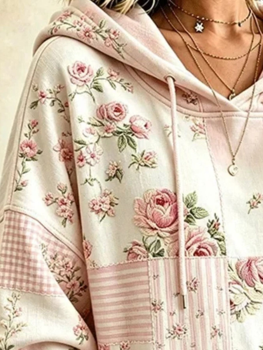 ivory pullover hoodie featuring drawstring and patchwork