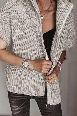 100% polyester Care instructions: Machine wash cold zip-up sweater in oatmeal with regular silhouette