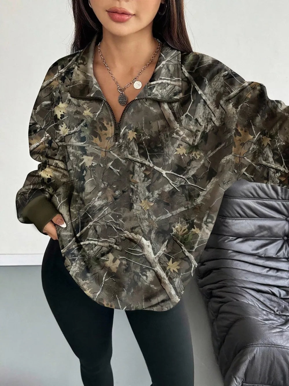 sweatshirt featuring camo in white with 95% polyester, 5% elastane Care instructions: Machine wash cold texture