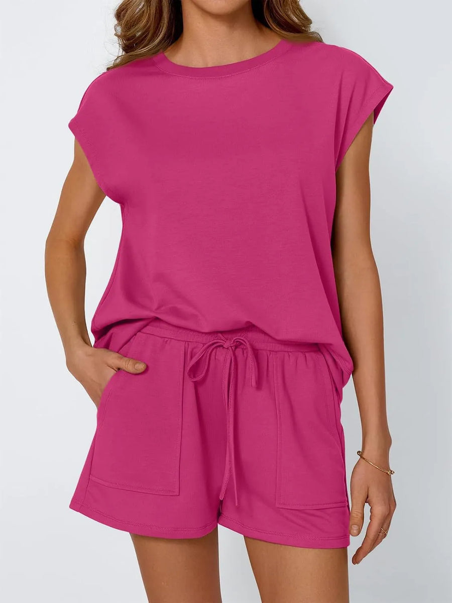 Hot Pink relaxed fit drawstring short set with cap sleeves and pocket detail.