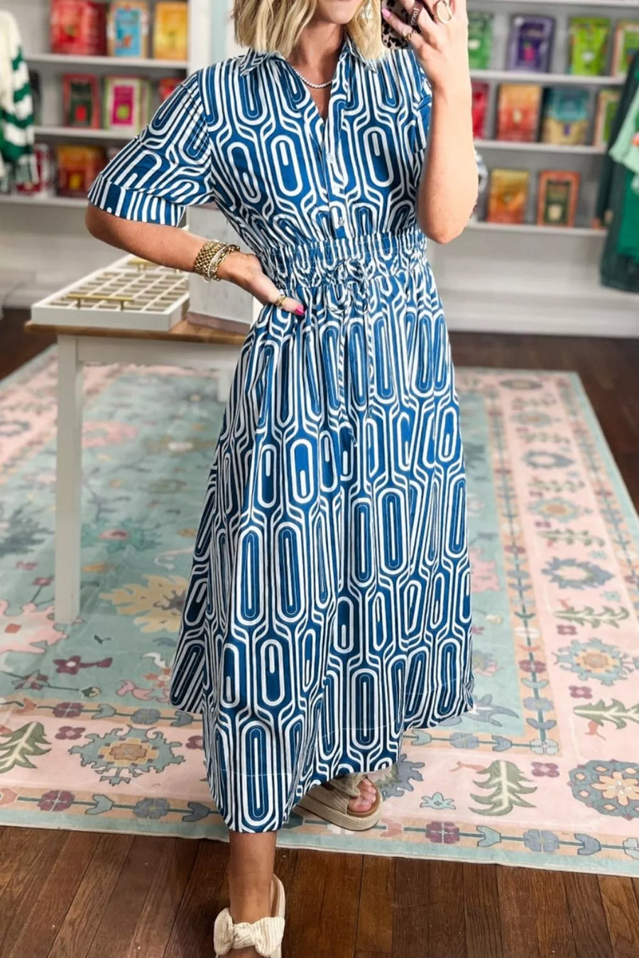 Blue and white geometric print midi shirt dress with drawstring waist and short sleeves